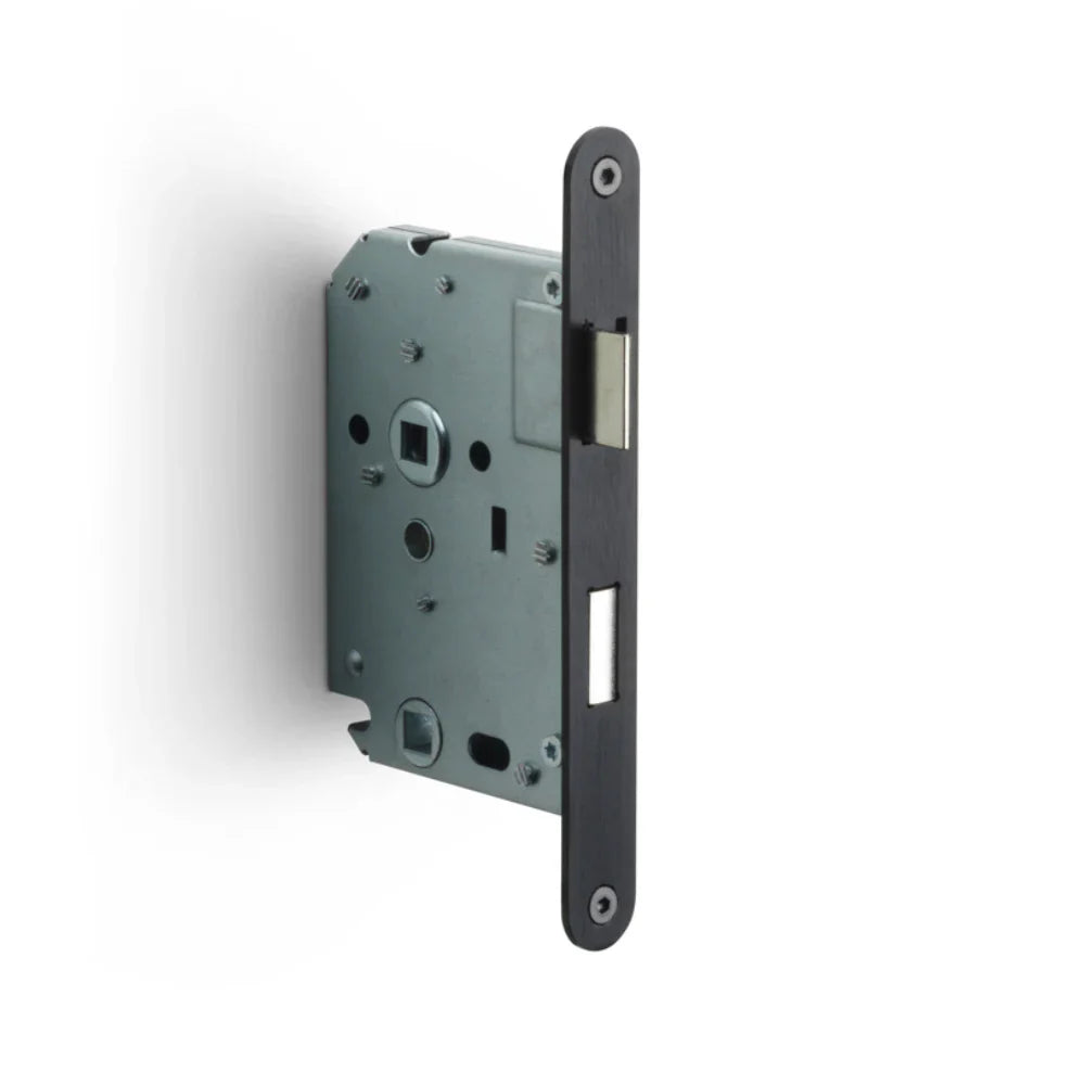 Formani BASICS LBLA-W63x8 deurslot toilet afgerond, LBLA-SFC loopdeurslot, LBLA-N56 sleutel afgerond plus LBLAY55 cilinder afgerond PVD Gun Metal — gun metal insteeksloten voor binnen- en voordeur in donker-metalen PVD-coating.