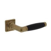 Intersteel deurkruk Ton 222 messing getrommeld ebbenhout vooraanzicht