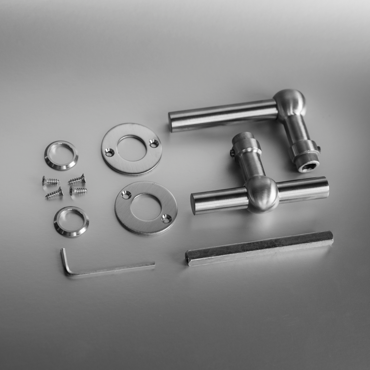 Intersteel Deurkruk L-T bol met ronde rozet 42x2 mm rvs geborsteld