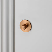 Buster + Punch Cross thumbturn WC-slot warm sunset vooraanzicht