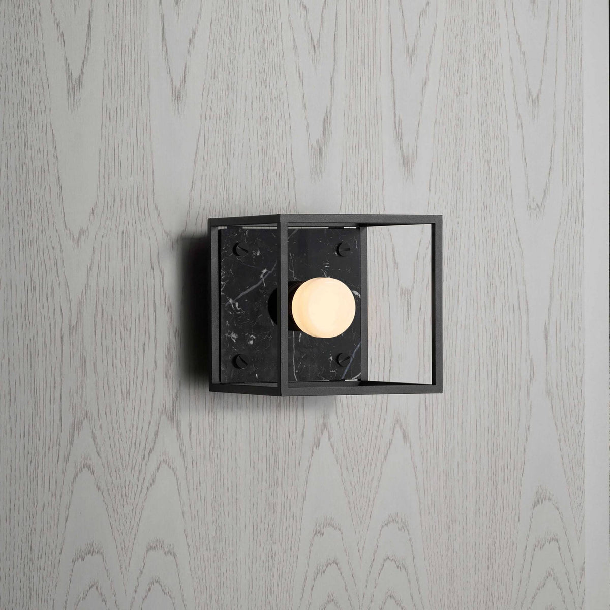 Buster + Punch Caged Wall wandlamp black marble vooraanzicht