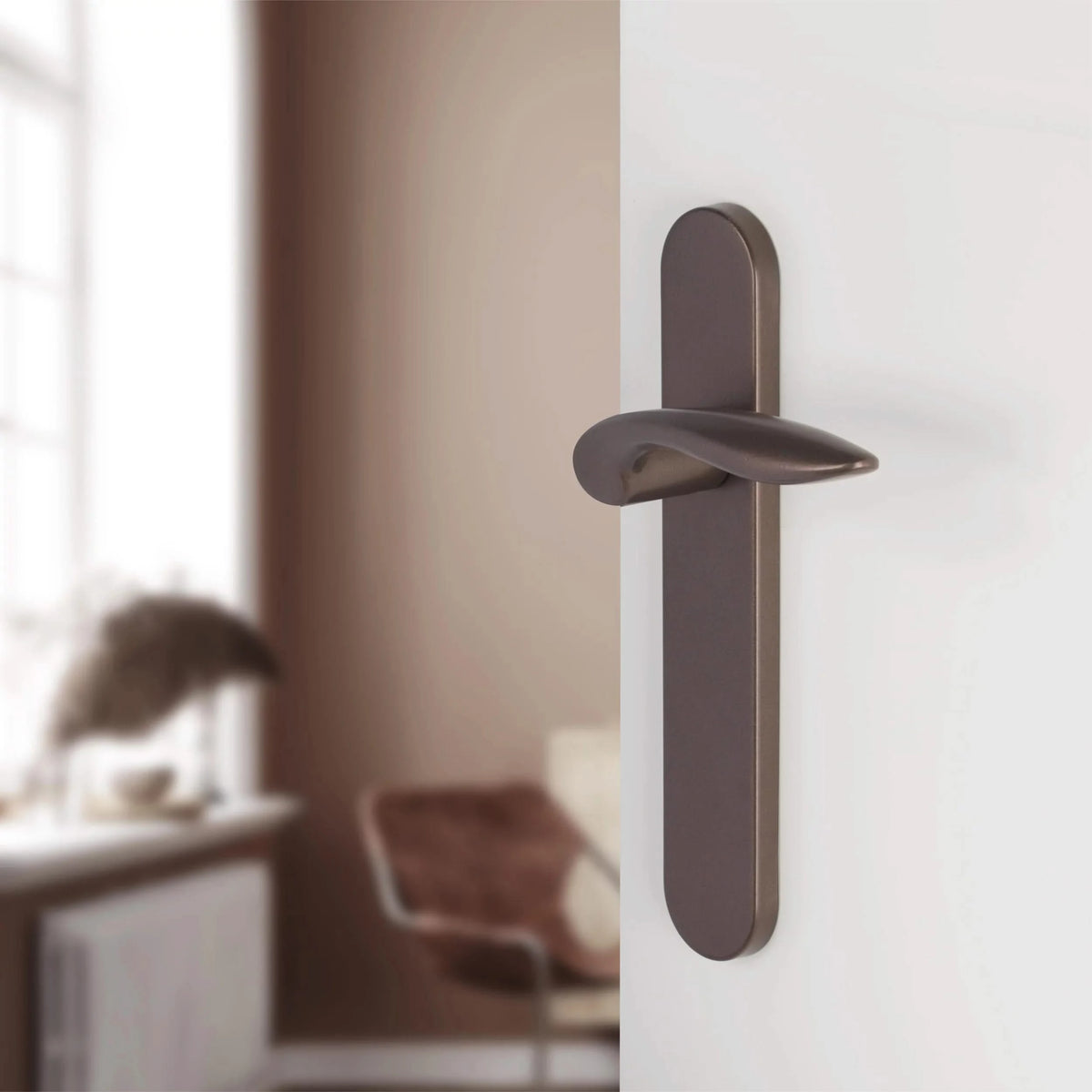 Differnz Groningen deurkruk ovaal blind schild brons – detail kruk